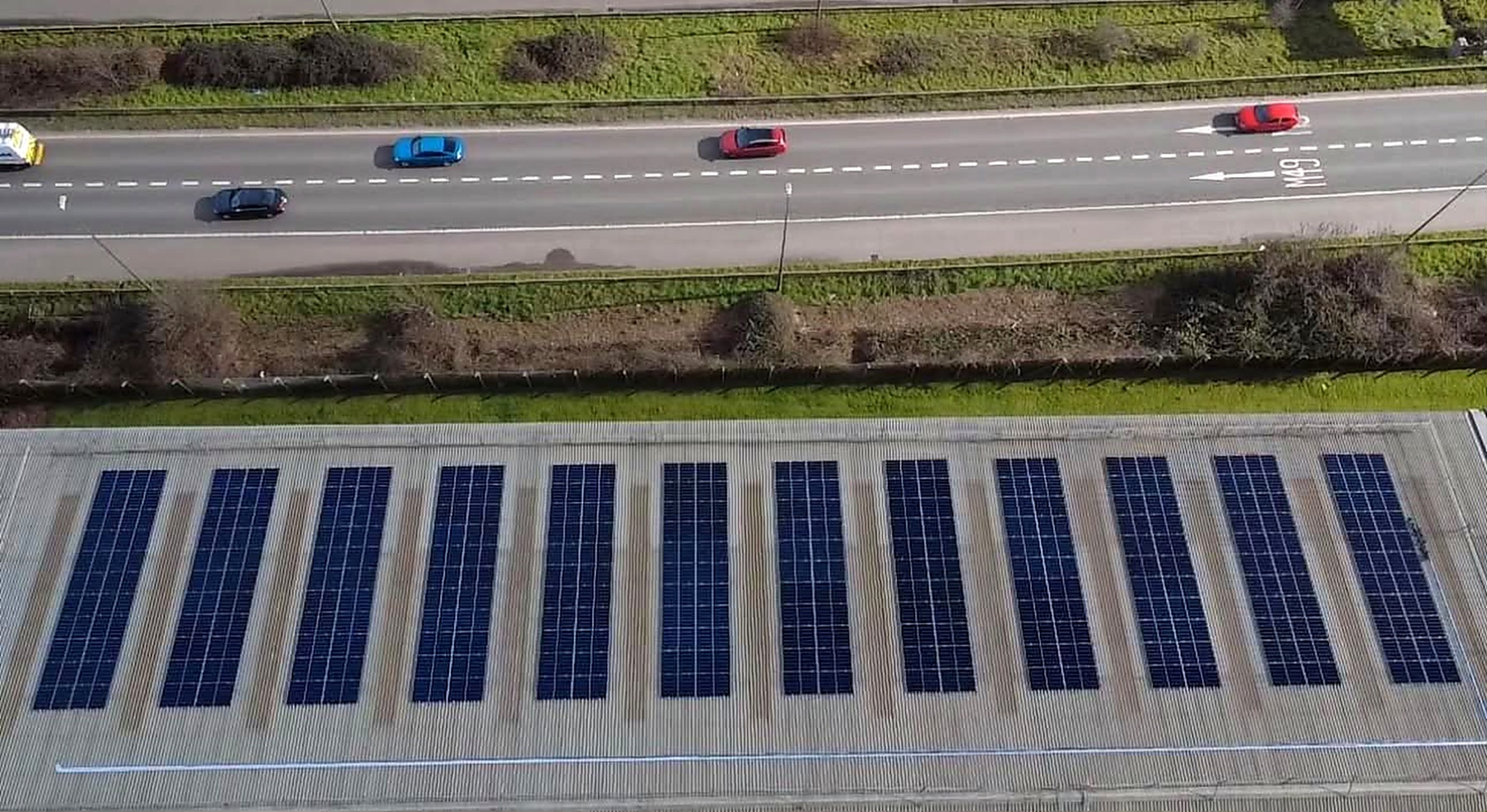 Aerial view of 115 kW rooftop solar PV array on the Caple building at Avonmouth Docks